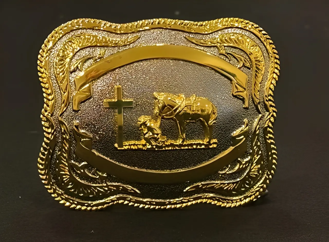 A silver and gold cowboy buckle.