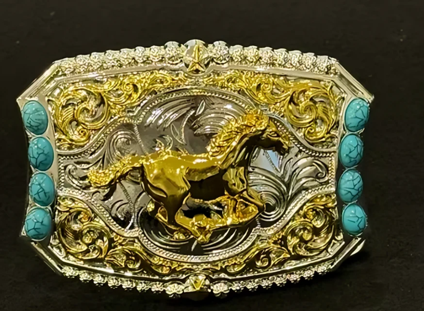 Turquoise detailing on a belt buckle.