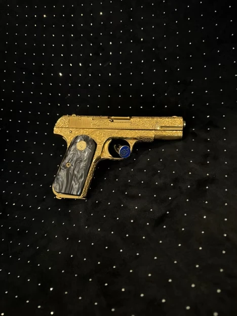 24K gold electroplating on a gun.
