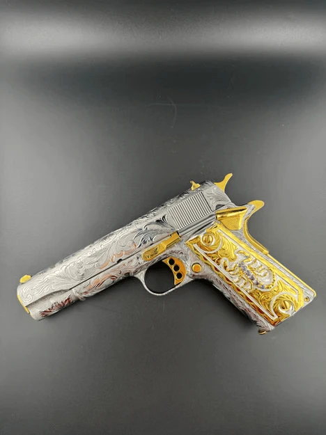 A gun with custom engraving by Gun Décor Emporium.
