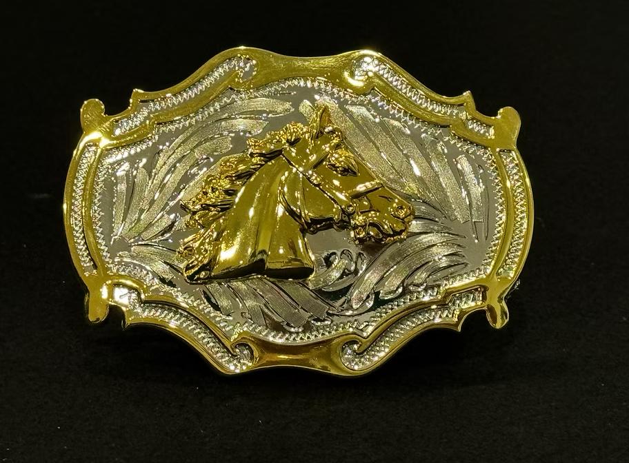 A decorative belt buckle featuring the face of a horse.