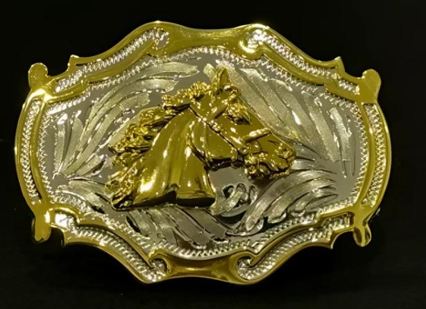 A golden cowboy buckle with a horse head
