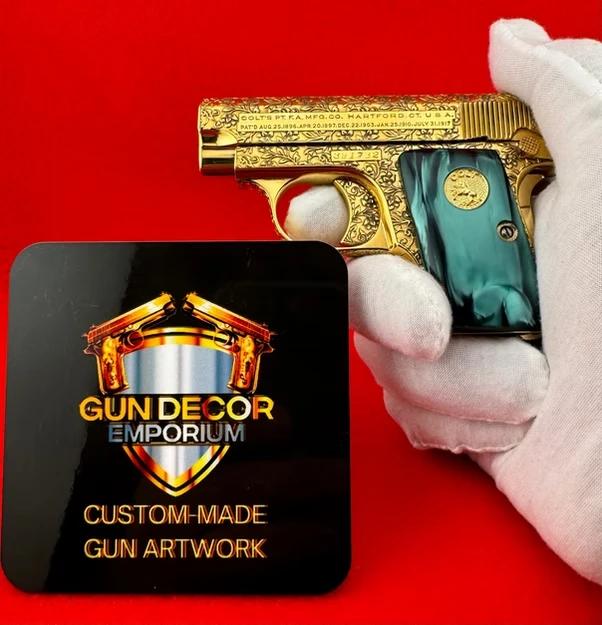 A Colt pistol with a pearl green grip and gold engraving and plating.