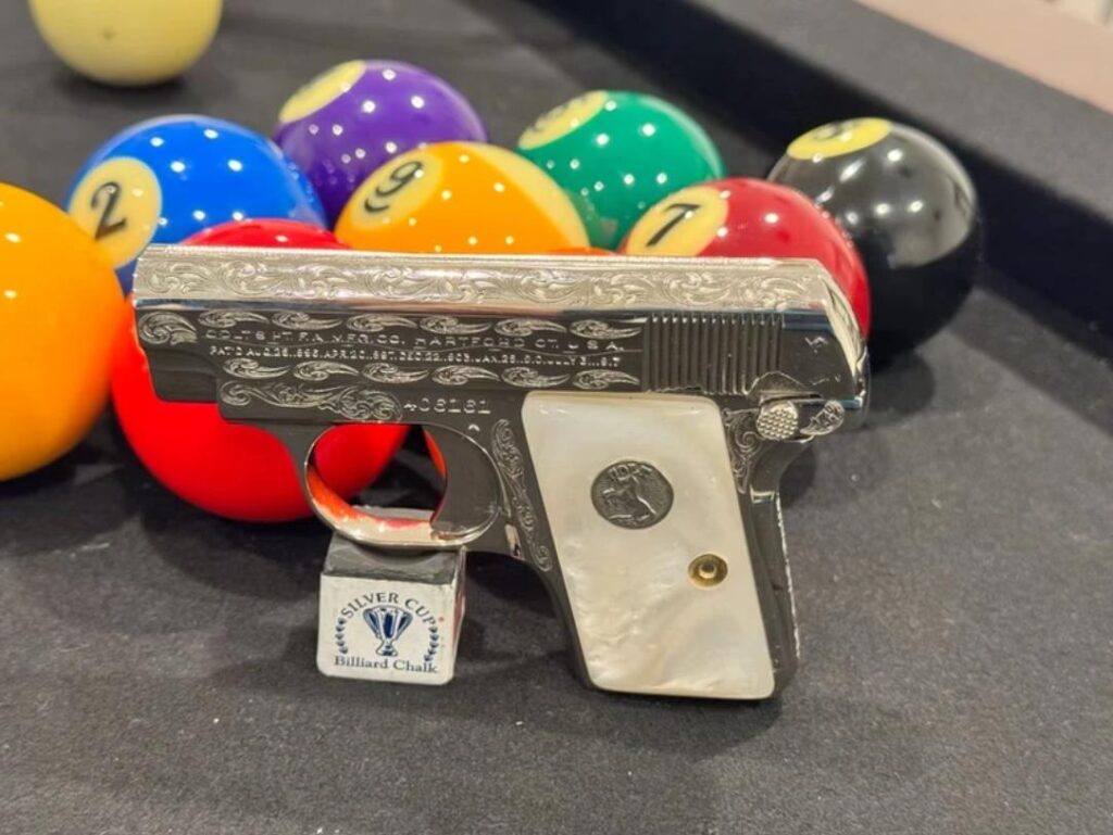 A small firearm with a custom gun grip.