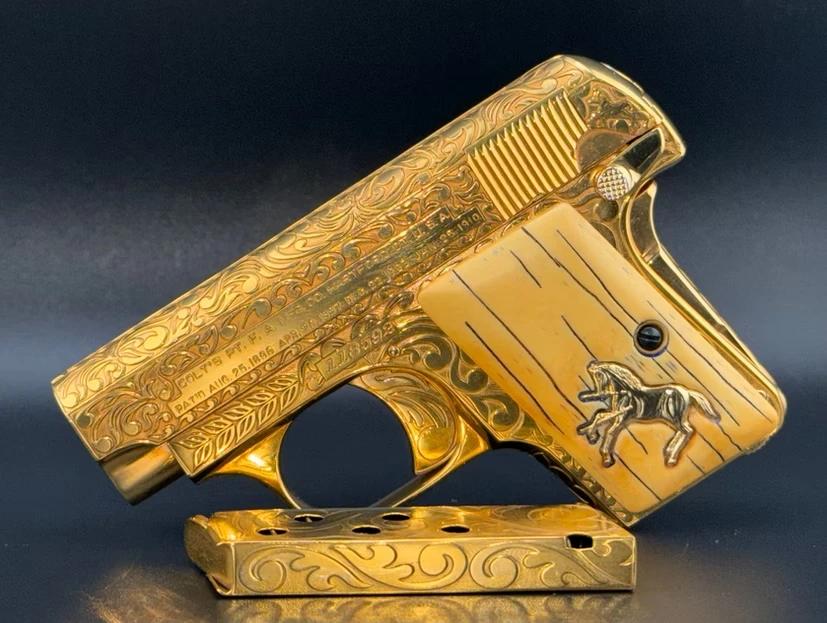 Gold-plated collectible firearm featuring premium custom grips and detailed decorative craftsmanship