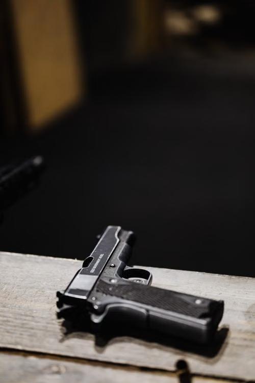 Pistol placed on a wooden surface